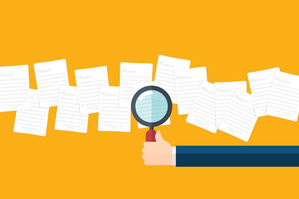 An illustration shows a hand holding a magnifying glass over scattered sheets of paper against an orange background.